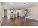 Modern kitchen with a large island, stainless steel appliances, and hardwood floors at 630 Daventry Ct, Clover, SC 29710