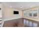 Bright living room with hardwood floors, a large window, and recessed lighting at 630 Daventry Ct, Clover, SC 29710