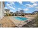 Backyard pool surrounded by well-maintained landscaping and lounge chairs at 630 Daventry Ct, Clover, SC 29710