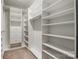Large walk-in closet featuring ample shelving and storage space for organization at 630 Daventry Ct, Clover, SC 29710