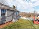 House exterior with yard and partial snow coverage at 701 Hiddenite Church Rd, Hiddenite, NC 28636