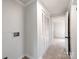 Hallway with additional storage and bedroom access at 701 Hiddenite Church Rd, Hiddenite, NC 28636