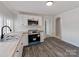 Updated kitchen with stainless steel appliances and butcher block countertops at 701 Hiddenite Church Rd, Hiddenite, NC 28636