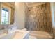 Bathroom with subway tile shower, bathtub, and modern vanity at 720 Ideal Way, Charlotte, NC 28209