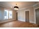 Spacious bedroom with hardwood floors and neutral walls at 720 Ideal Way, Charlotte, NC 28209