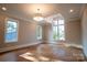 Spacious bedroom with hardwood floors and large windows at 720 Ideal Way, Charlotte, NC 28209