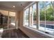 Bonus room with hardwood floors and view of pool at 720 Ideal Way, Charlotte, NC 28209
