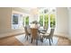Breakfast nook with round table, large windows, and a chandelier at 720 Ideal Way, Charlotte, NC 28209