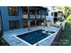 Private backyard pool with brick border and patio at 720 Ideal Way, Charlotte, NC 28209