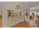 Custom bar area with cabinetry, granite countertops, and wine storage at 7409 Stonecroft Park Dr, Charlotte, NC 28226