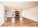 Living room with hardwood floors, fireplace and two ceiling fans at 748 Skinner Rd, Shelby, NC 28152