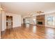 Living room with brick fireplace and laminate floors at 748 Skinner Rd, Shelby, NC 28152