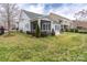 House with backyard, patio, screened porch and grassy yard at 867 Pecan Tree Ln, Fort Mill, SC 29715