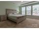 Spacious bedroom with carpeted floor and large window at 867 Pecan Tree Ln, Fort Mill, SC 29715