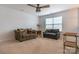 Bonus room with two sofas and a ceiling fan at 867 Pecan Tree Ln, Fort Mill, SC 29715