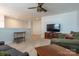Bonus room with a ceiling fan, TV stand and comfy seating at 867 Pecan Tree Ln, Fort Mill, SC 29715