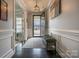 Elegant entryway with dark hardwood floors and bench at 867 Pecan Tree Ln, Fort Mill, SC 29715
