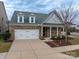 Brick and siding home with a two-car garage at 867 Pecan Tree Ln, Fort Mill, SC 29715