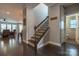 Elegant staircase with wrought iron balusters at 867 Pecan Tree Ln, Fort Mill, SC 29715