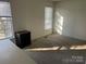 Well-lit bedroom with carpeted floor at 10006 White Cascade Dr, Charlotte, NC 28269