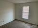 Empty bedroom with neutral walls and carpet at 10006 White Cascade Dr, Charlotte, NC 28269