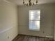 Simple dining room featuring a chandelier at 10006 White Cascade Dr, Charlotte, NC 28269