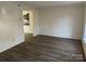 Bright living room with laminate flooring at 10006 White Cascade Dr, Charlotte, NC 28269
