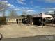 Property with a cottage, shed, and covered parking at 105 Richard Dr, New London, NC 28127