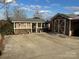 Cute cottage, detached garage, and ample parking at 105 Richard Dr, New London, NC 28127