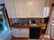 Kitchen features butcher block countertops and dishwasher at 105 Richard Dr, New London, NC 28127