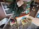 Beach-themed tiki bar with colorful stools at 105 Richard Dr, New London, NC 28127