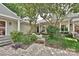 Charming home exterior with lush landscaping and welcoming walkway at 1077 Sardis Cove Dr, Charlotte, NC 28270
