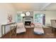 Cozy living room featuring a fireplace, comfortable seating, and stylish décor at 1077 Sardis Cove Dr, Charlotte, NC 28270