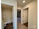 Hallway with doors to bedrooms and bathroom at 110 Oak Crossing Dr, Shelby, NC 28152