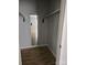 Walk-in closet with wood floors, full-length mirror, and built-in hanging rods at 11041 Cedar View Rd, Charlotte, NC 28226