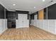 Entertaining basement with built-in bar, and an activity area with a chalkboard wall at 11052 Preservation Park Dr, Charlotte, NC 28214