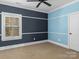 Bright bedroom with painted walls and a ceiling fan at 11052 Preservation Park Dr, Charlotte, NC 28214