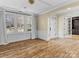 Formal dining room with hardwood floors and access to library at 11052 Preservation Park Dr, Charlotte, NC 28214