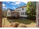 View of back of house and outdoor patio at 11052 Preservation Park Dr, Charlotte, NC 28214