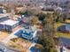 Aerial view of a quaint home featuring a charming front porch and landscaped yard in a mature neighborhood at 132 N Confederate Ave, Rock Hill, SC 29730