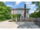 Spacious backyard with deck and climbing roses, perfect for outdoor entertaining at 132 N Confederate Ave, Rock Hill, SC 29730