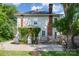Spacious backyard with deck and climbing roses, perfect for outdoor entertaining at 132 N Confederate Ave, Rock Hill, SC 29730