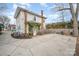 Backyard featuring a concrete patio, brick chimney, wooden deck, and grassy yard at 132 N Confederate Ave, Rock Hill, SC 29730