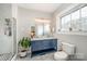 Bathroom with double sinks, glass enclosed shower, modern fixtures, and a bright window at 132 N Confederate Ave, Rock Hill, SC 29730