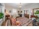 Comfortable living room with hardwood floors, area rug, and traditional furnishings at 132 N Confederate Ave, Rock Hill, SC 29730