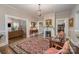 Cozy living room featuring a fireplace, hardwood floors, and traditional decor at 132 N Confederate Ave, Rock Hill, SC 29730
