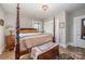 Main bedroom features hardwood floors, natural lighting and a four post bed at 132 N Confederate Ave, Rock Hill, SC 29730