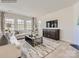 Living room with sofa, coffee table, and media cabinet at 1988 Copper Path Dr, Fort Mill, SC 29715