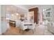 Spacious open kitchen with island seating, modern appliances, and view to the living room at 2400 Mecklenburg Ave, Charlotte, NC 28205