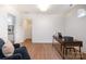Bright office space with wood floors, large desk, chair, and view to the outdoors at 2400 Mecklenburg Ave, Charlotte, NC 28205